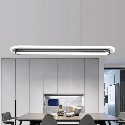 Modern minimalist pendant light with white elliptical island design featuring black trim for table lighting by decorbites