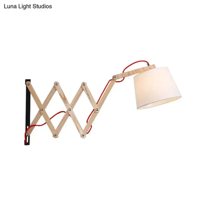 Modern white fabric wall lamp with a light wood extendable arm and red cord for living room led incandescent fluorescent use