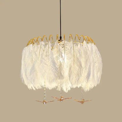 Elegant modern white feather chandelier with gold wire frame and dangling bird ornaments for living room pendant light