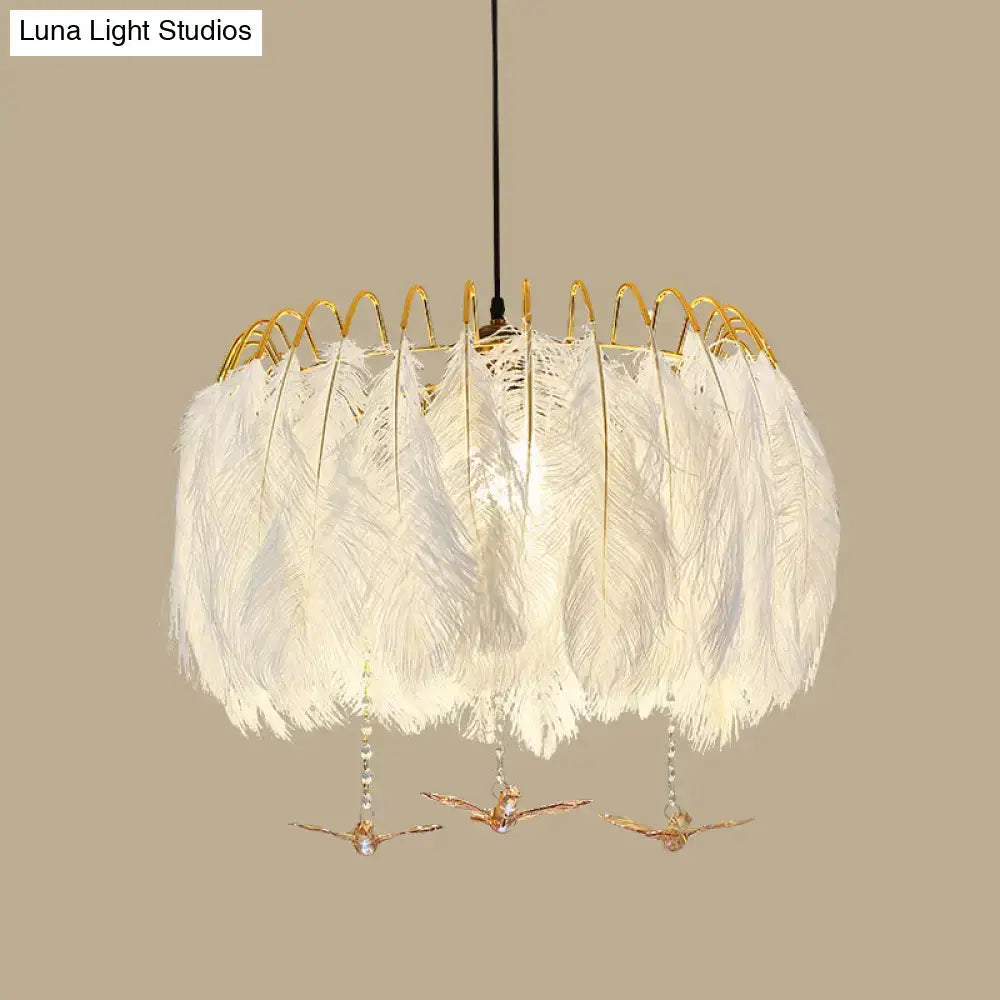 Modern white feather chandelier with gold wire frame and decorative bird charms for living room pendant lighting