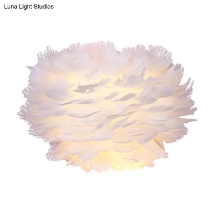 Modern white feather wall lamp with soft fluffy feathers and warm glow for stylish home decoration bedroom wall lamp