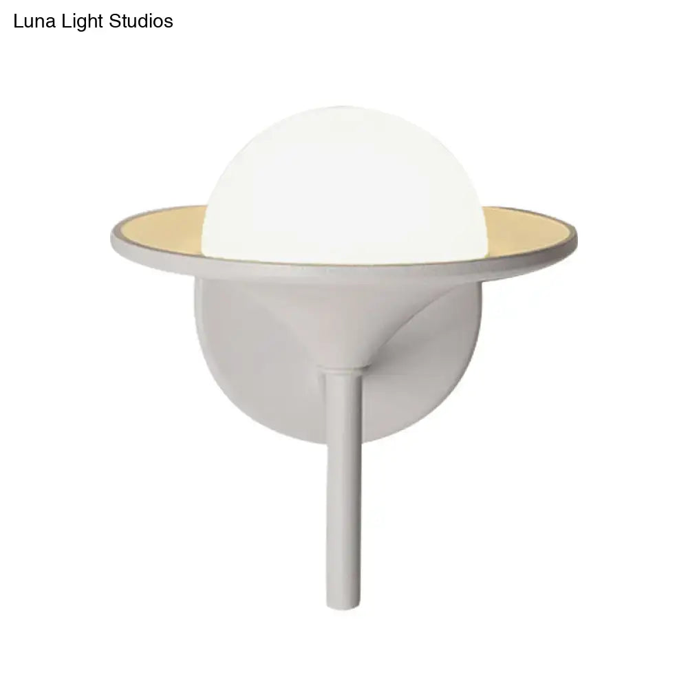 Modern white flared sconce light with white spherical globe and gold ring mounted on minimalist bedroom wall fixture 110v-120v