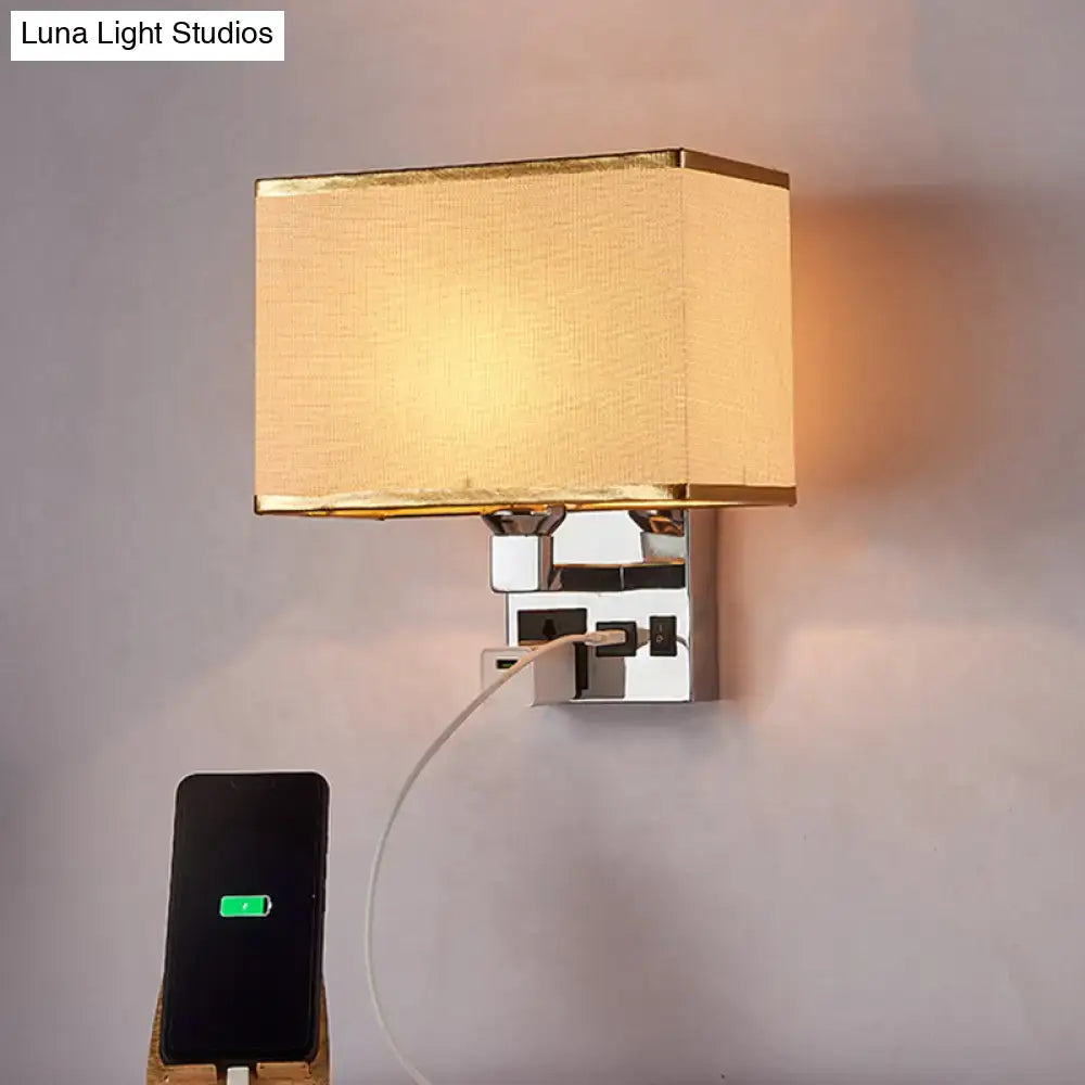 Modern beige fabric wall light with gold trim on chrome base featuring built-in usb charging port bedroom sconce