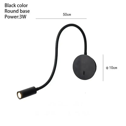 Black gooseneck reading lamp with round base and flexible arm designed as a modern wall spot light for bedrooms