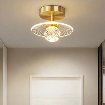 Modern white flower led ceiling lamp featuring a gold-toned crystal globe and circular wireframe halo decorbites led ceiling
