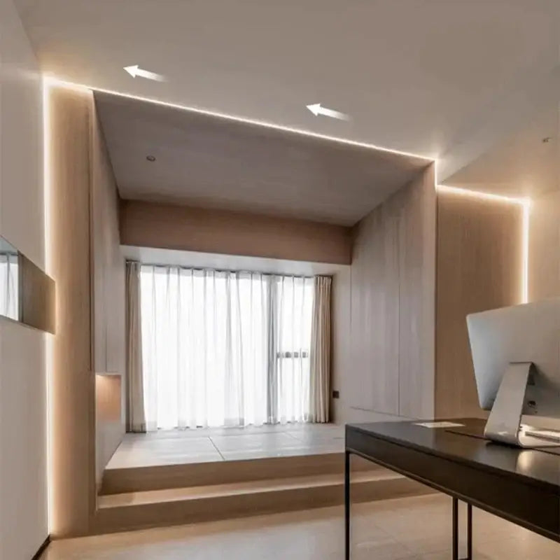 Minimalist wooden desk with sleek black metal legs illuminated by modern white flowing led strip light wall decor