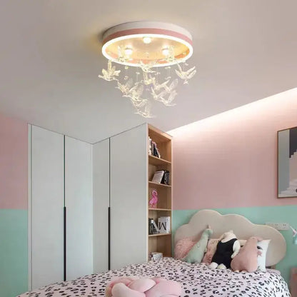 Modern white flying bird ceiling light for kids bedroom with pink and white rim and clear crystal bird ornaments decorbites flying bird