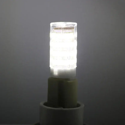 Modern white g9 led corn bulb chandelier lamp with clear glass cylindrical led corn bulb on green base for living room