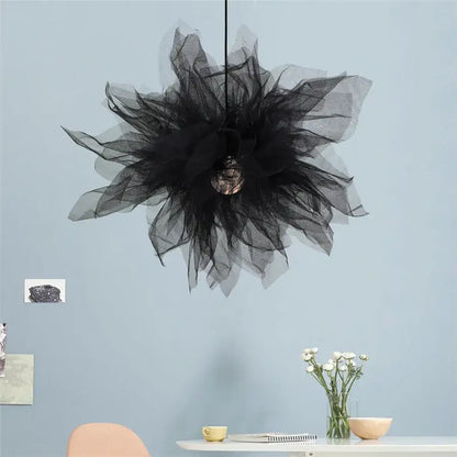 Modern white gauze flower pendant light featuring a black tulle chandelier with a central metallic bulb by decorbites gauze