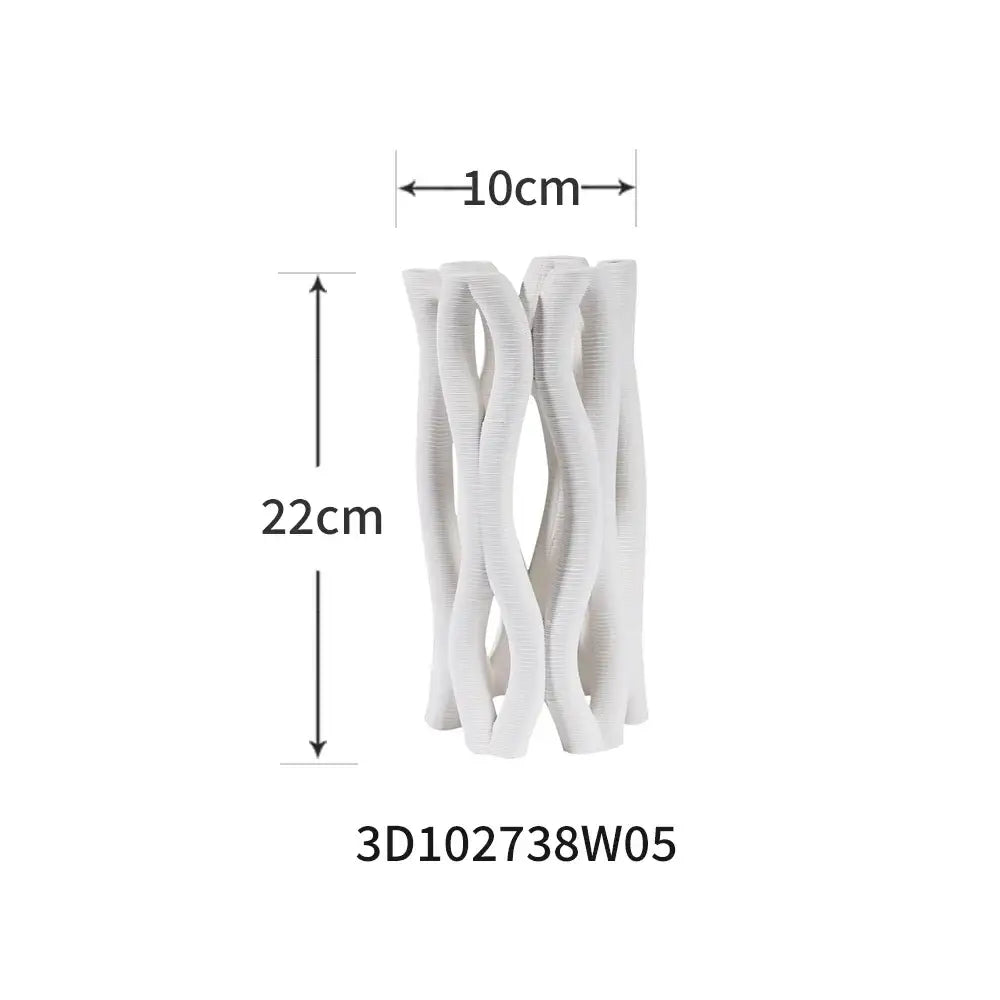 Modern white geometric ceramic hollow vase with intertwined design for living room decorbites decorbites geometric ceramic hollow vases