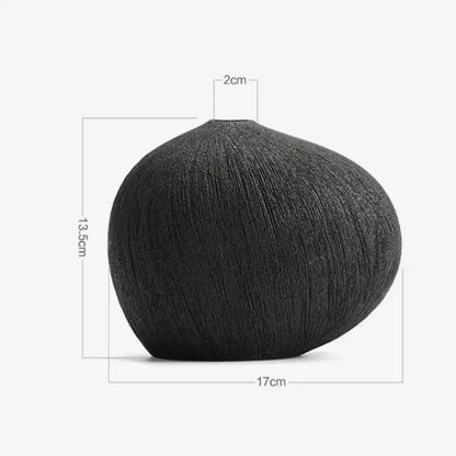 Black textured ceramic vase with rounded body and narrow neck for modern white geometric stripes ceramic living room decorbites geometric stripes decor