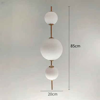 Modern white glass ball led pendant light with frosted spherical shades and brass rods, 85cm height for kitchen and dining room decorbites glass ball