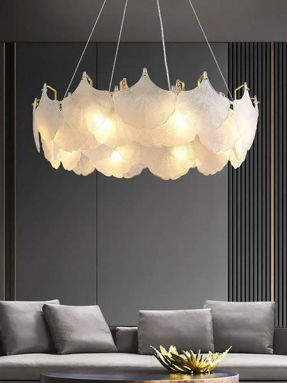 Modern white glass chandelier led with translucent petal-shaped shades and gold frame for dining room use