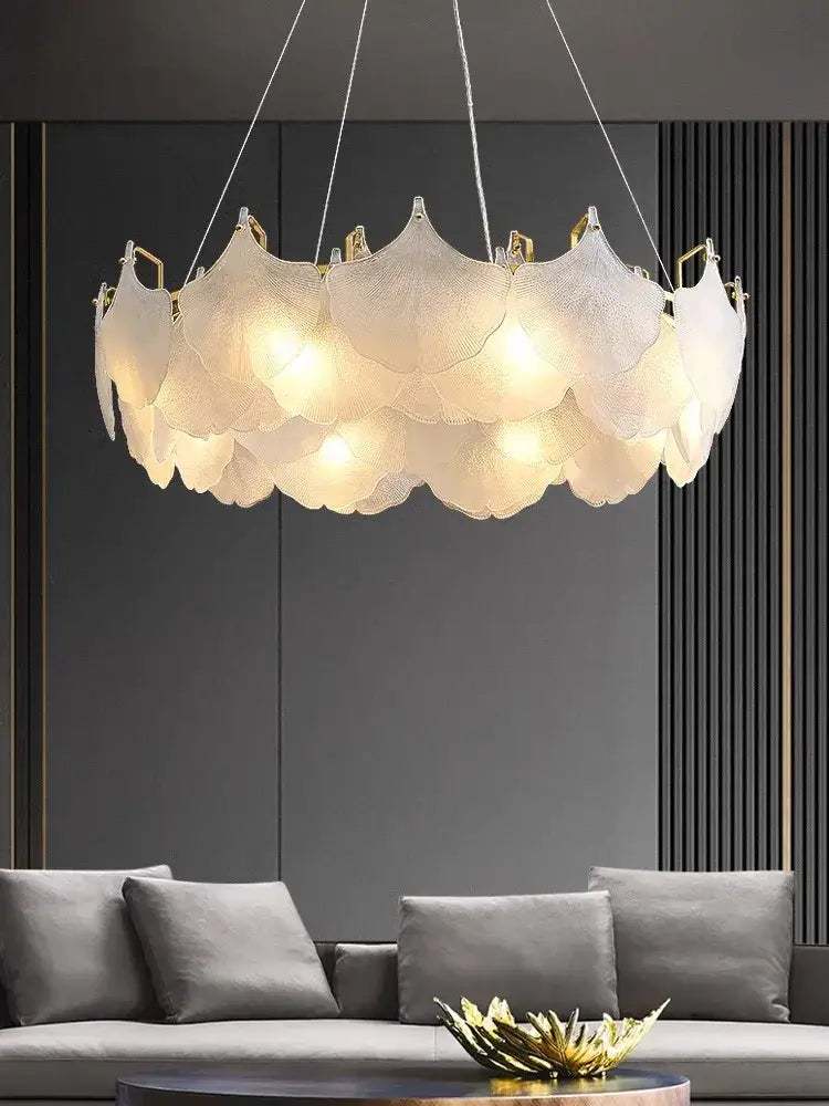 Modern white glass chandelier led with translucent petal-shaped shades and gold frame for dining room use