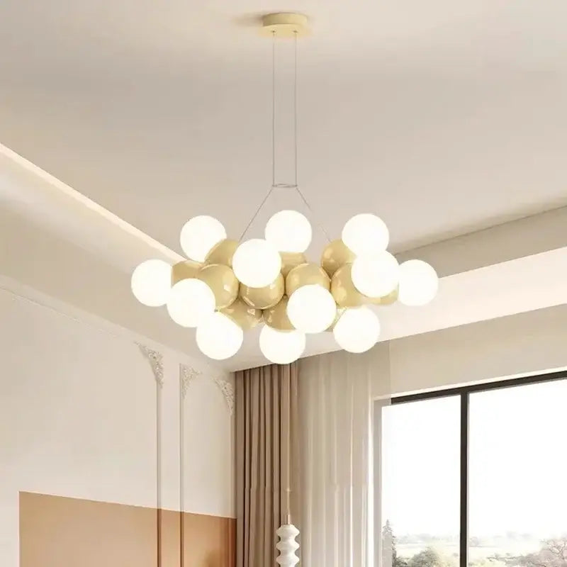 Modern white glass globe pendant light fixture with glossy white and gold bulbs for dining room pendant light fixture