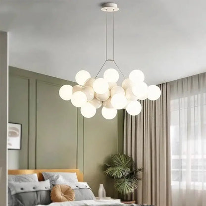 Modern white glass globe pendant light fixture with minimalist metal frame for dining room lighting