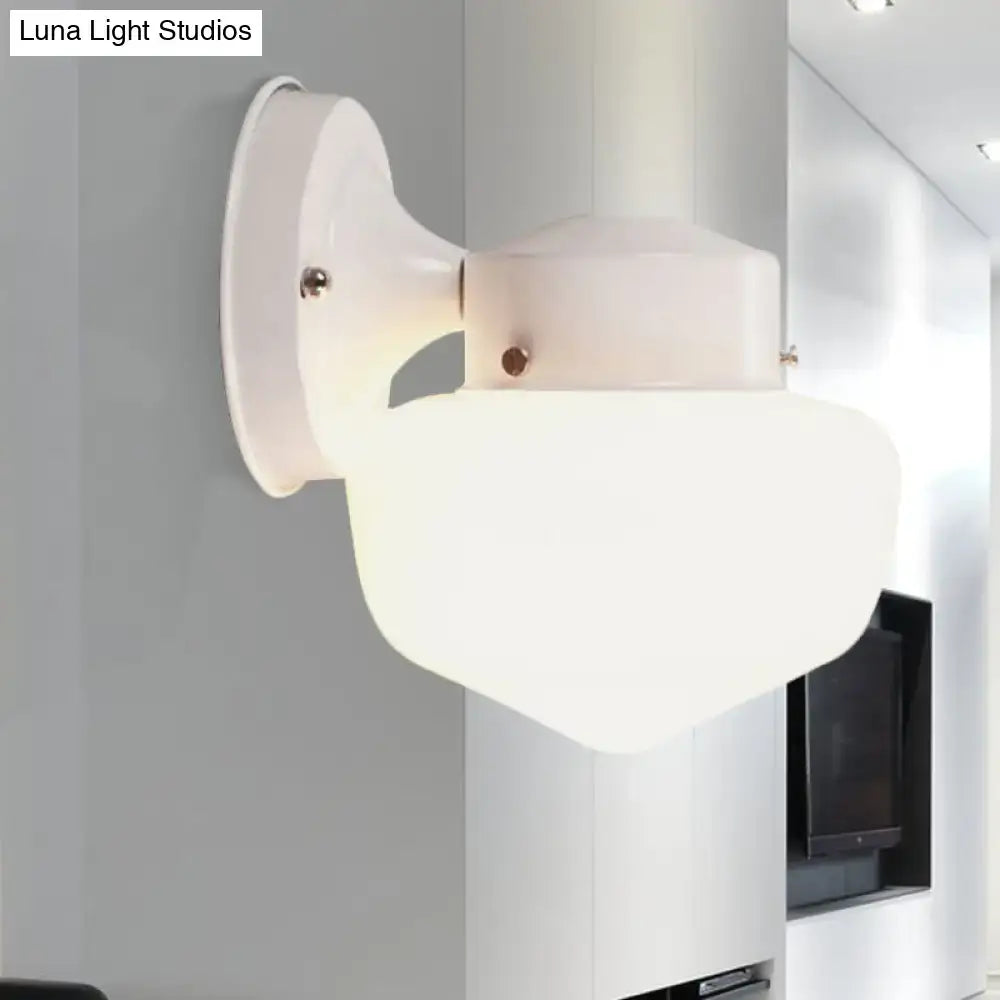 Modern white glass sconce light with frosted glass shade and metallic bracket for bedroom black white mirror décor