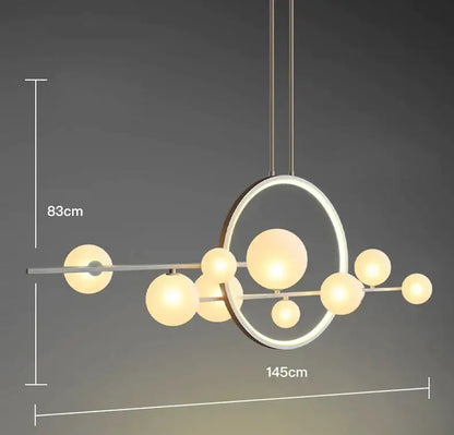 Modern white glass strip bubble chandelier kitchen bar pendant light with sleek metallic frame and warm frosted glass spheres decorbites glass strip