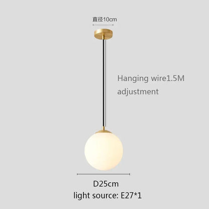 Modern gold-finished pendant light with white globe shade frosted glass for kitchen and dining room lighting