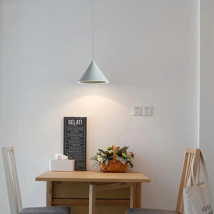 A minimalist modern white and gold annular cone pendant lamp with a smooth matte finish for living room decorbites pendant lamp