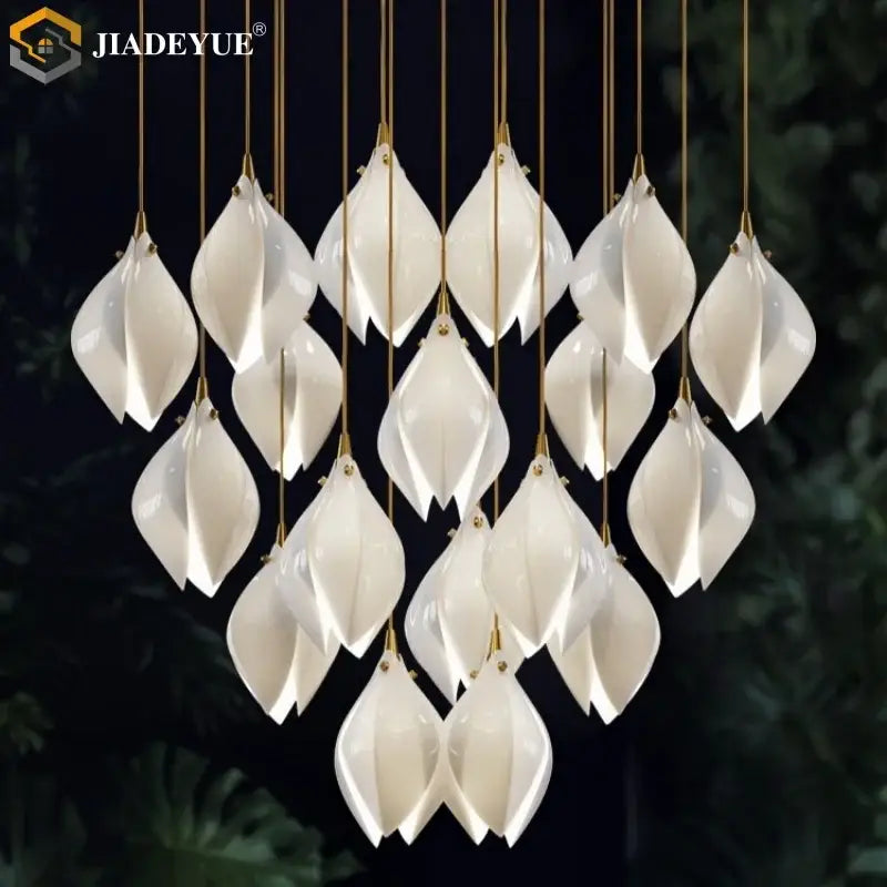 Elegant white ceramic led staircase pendant light with gold-toned accents and modern leaf design by decorbites ceramic led