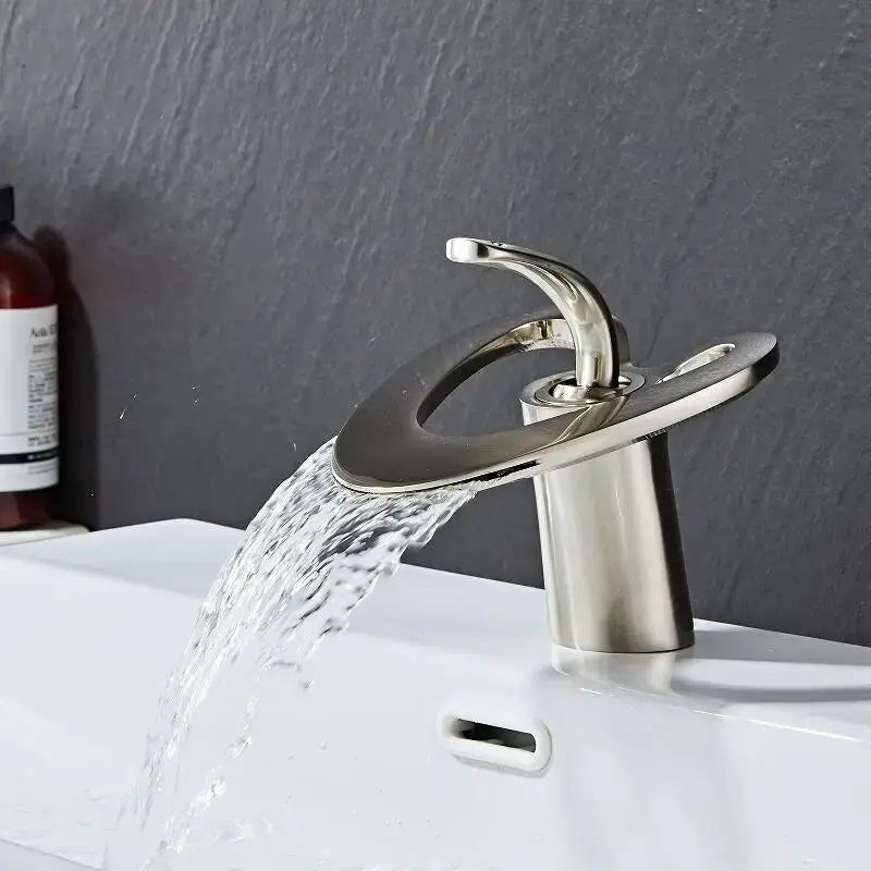 Modern white and gold basin faucet with brushed nickel waterfall spout and circular base by decorbites golden white