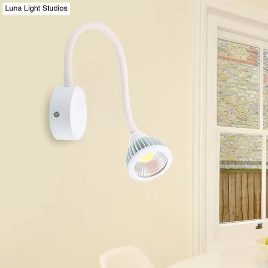 Modern white flexible gooseneck wall sconce light with frosted lens and circular base for direct wired electric bedroom reading