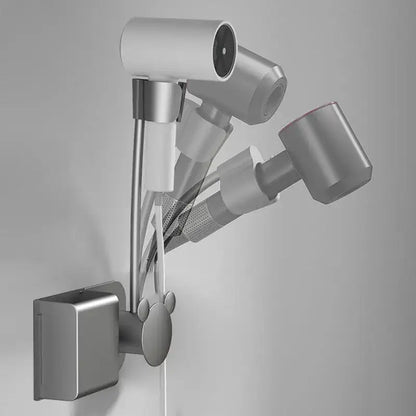 Modern white and gray wall mounted hair dryer storage rack with silver metallic adjustable showerhead and paw print decorbites bathroom hair