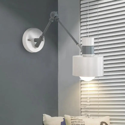 Modern white and grey wall sconce light with adjustable articulated arm for bedroom wall mounted lighting fixture