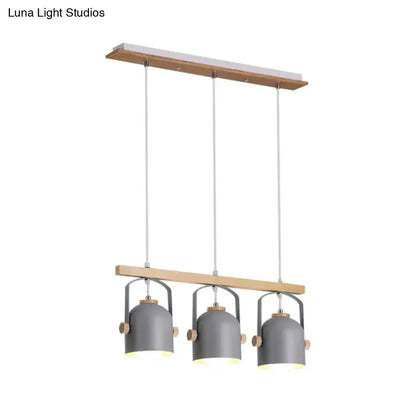 Modern grey dome shade pendant light with wooden accents and three hanging lampshades by DecorBites™