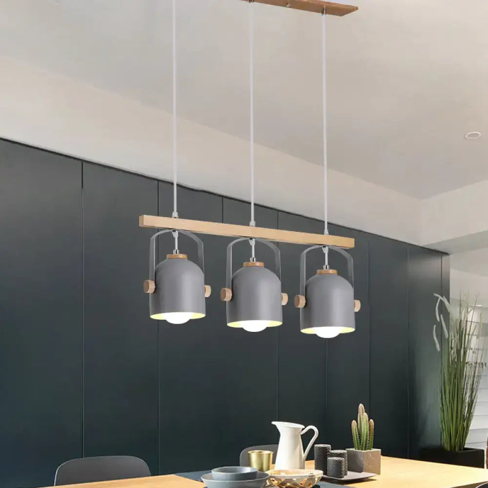 Modern grey dome shade pendant light with wooden accents featuring three hanging lampshades by decorbites