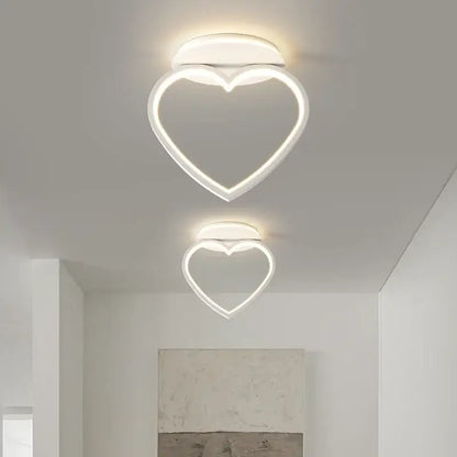 Modern white heart ceiling light with two led fixtures emitting a soft glow ideal for bedroom decorbites ceiling light