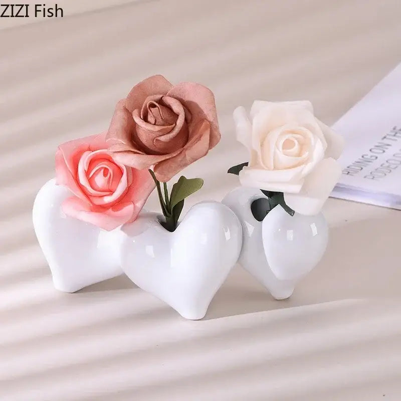Modern white decorbites heart ceramic vases with artificial pink peach and cream roses for desk decor