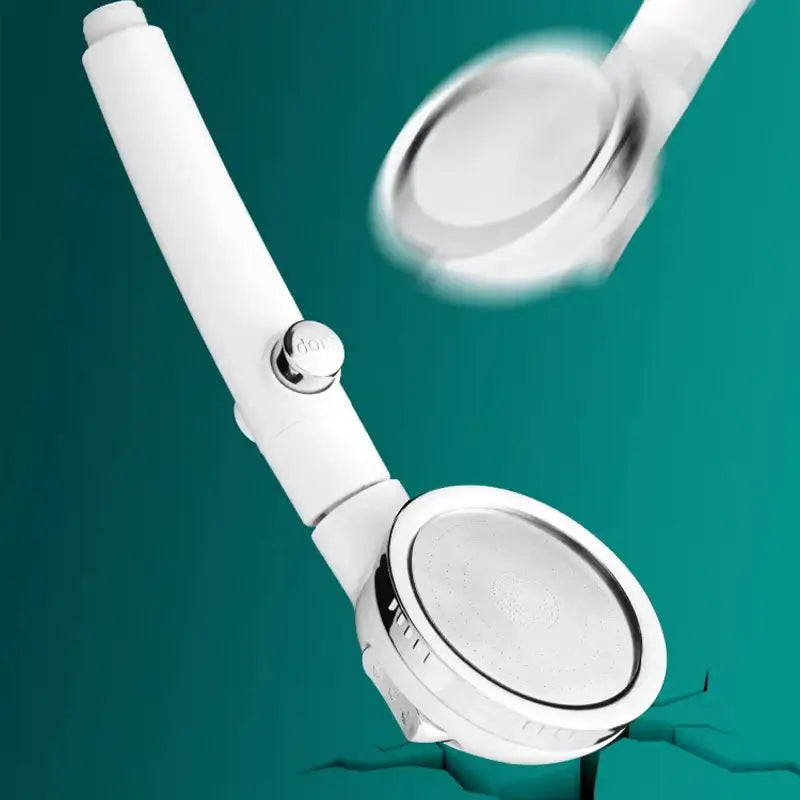 Modern white handheld high pressure shower head with chrome accents and flexible hose for efficient bathroom use