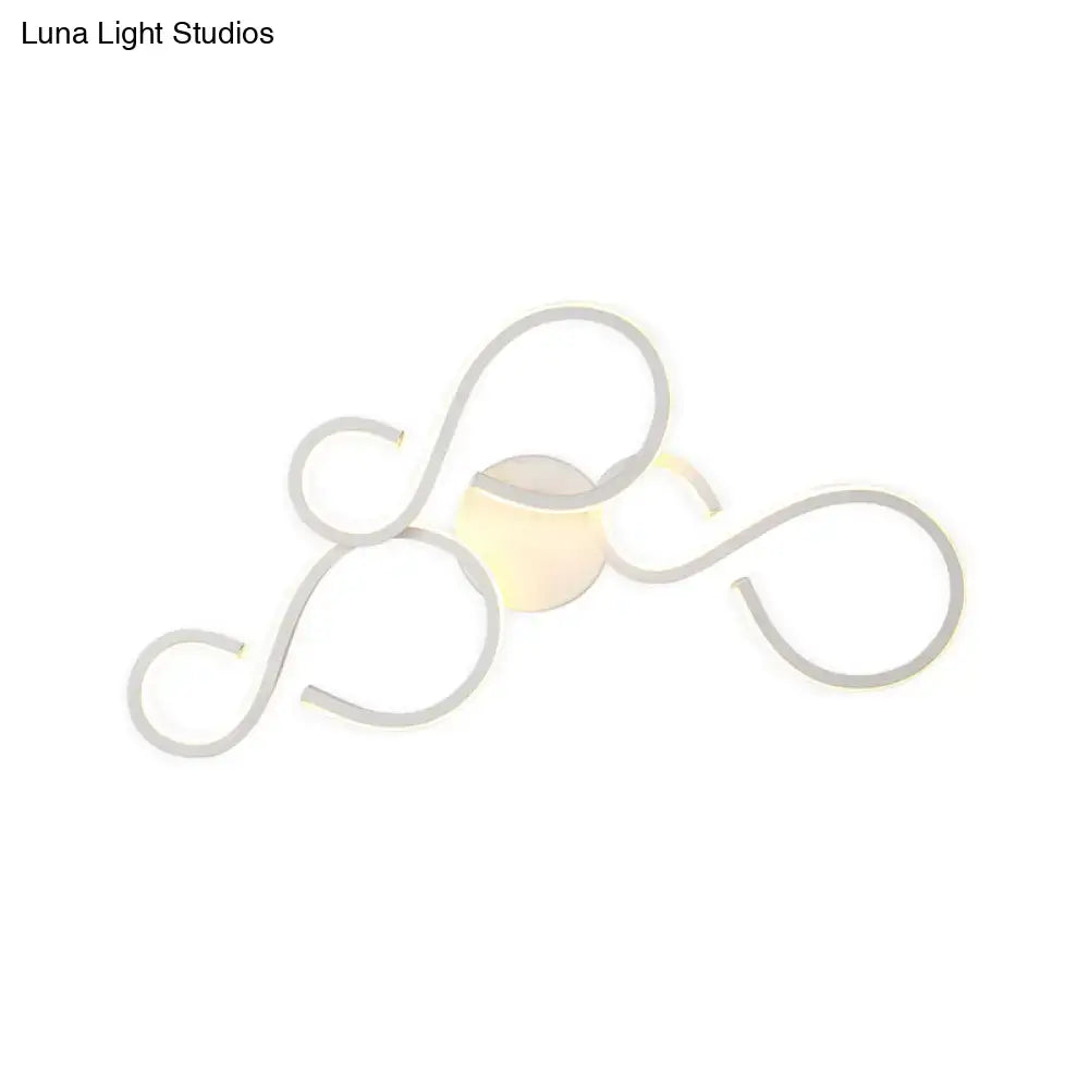 Modern white infinity spiral led light with sleek silver twisted wire design and warm glow bulb included for living room