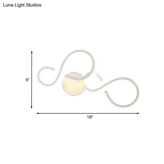 Modern white infinity spiral led light with sleek curved arms and warm glow bulb included for living room use