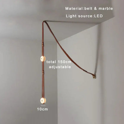 A sleek adjustable 150cm pendant lights wall sconce made of brown leather and designer belt marble for modern decorbites