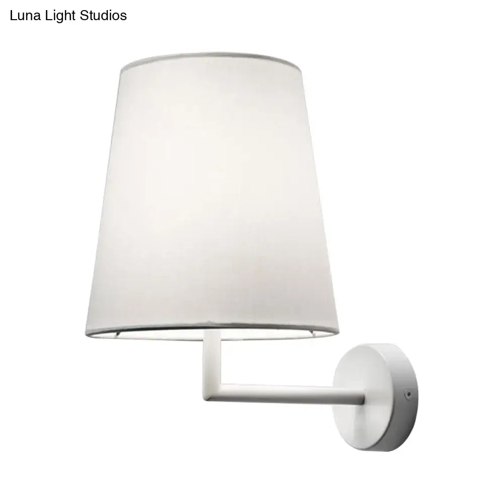 Modern white led cone wall mounted fabric sconce with tapered translucent shade and minimalist metal arm for living room lighting