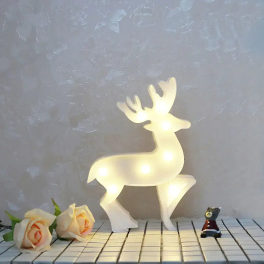 Modern white led reindeer nightstand light with glowing silhouette and remote control as a christmas element
