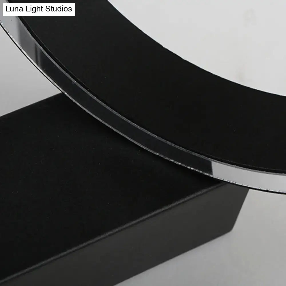 Modern white led wall sconce with black circular mirror and direct wired power source for living room use