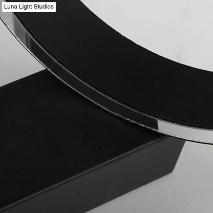 Modern white led wall sconce with black circular mirror and direct wired power source for living room use