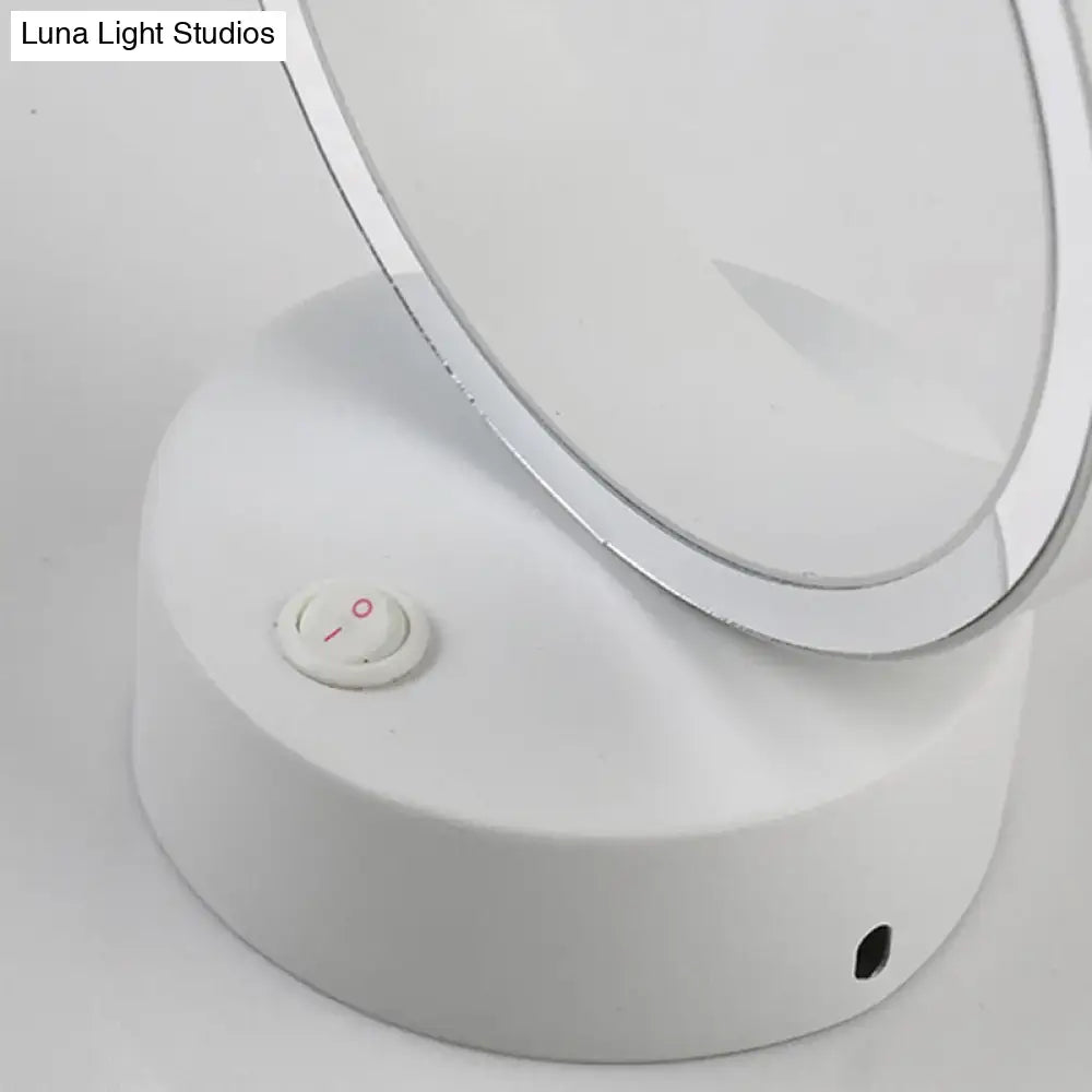 Modern white led wall sconce with a silver rim and integrated led light featuring a direct wired power source button