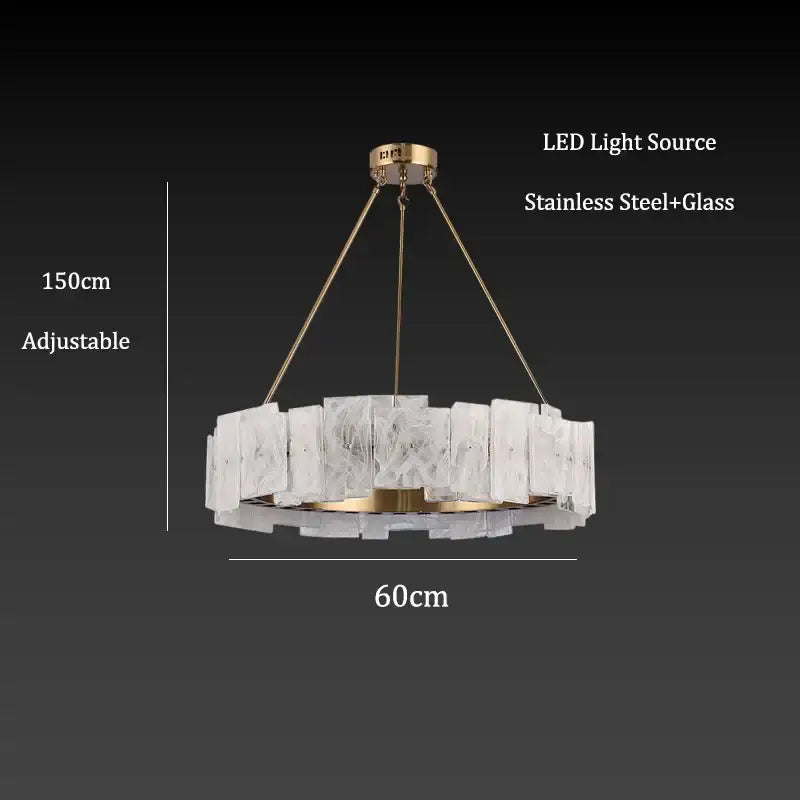 A modern gold-toned stainless steel circular pendant light with frosted cloud mist glass panels for dining room decorbites cloud mist