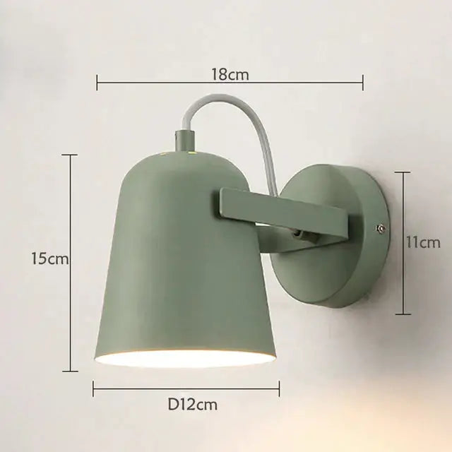Modern sage green metal ferrell wall lamp with adjustable arm and minimalist design for bedroom spotlight use