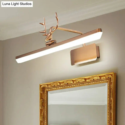 A sleek modern white metal vanity wall lamp with bronze deer head design and rectangular led light for bathroom use