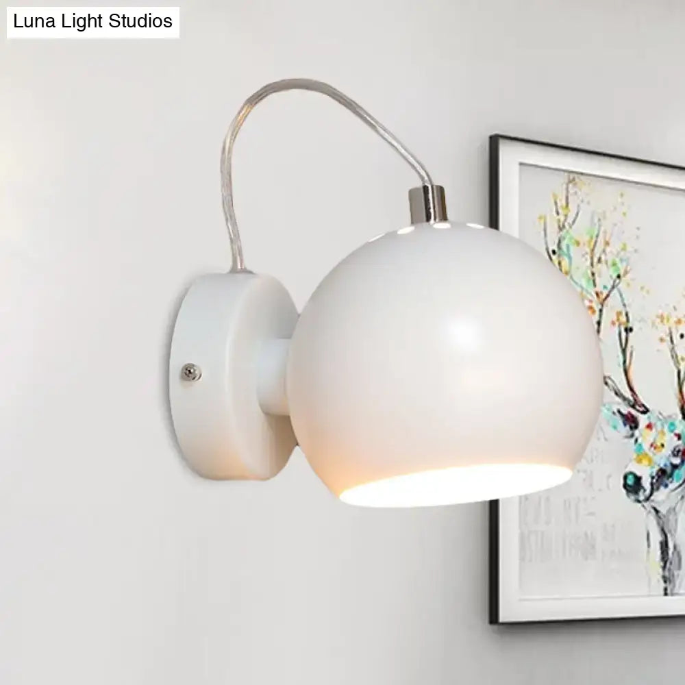 Modern white wall light with metal shade featuring a curved arm and frosted glass for 110v-120v bedroom fixture