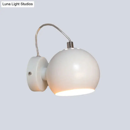Modern white wall light with curved metal shade and frosted glass designed for 110v-120v bedroom use