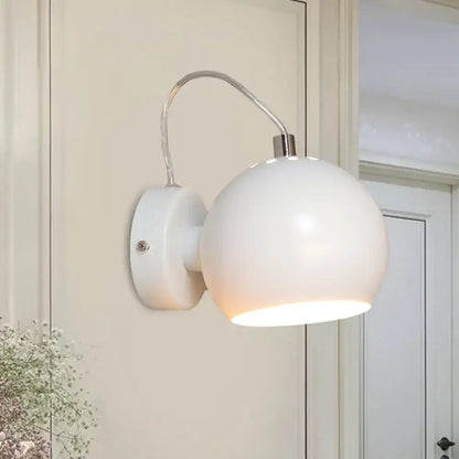 Modern white metal shade wall light with spherical matte finish and curved arm for bedroom 110v-120v fixture