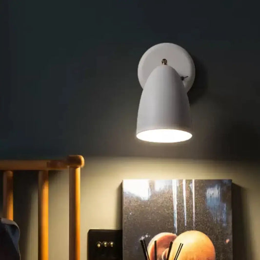 Modern white ceramic wall-mounted reading lamp with metal shade and white flare for bedroom wall lighting