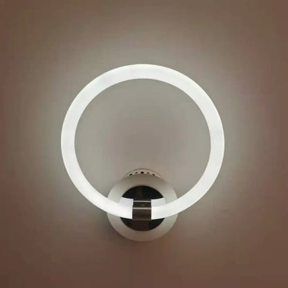 Modern white minimalist acrylic led wall lamp with a sleek circular design for bedroom use wall lamp lighting solution